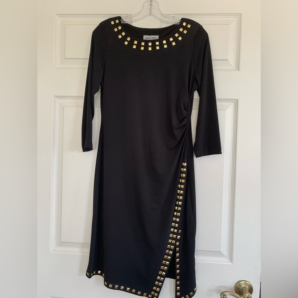 Sexy, but sophisticated midi dress with side split and gold trim embellishment